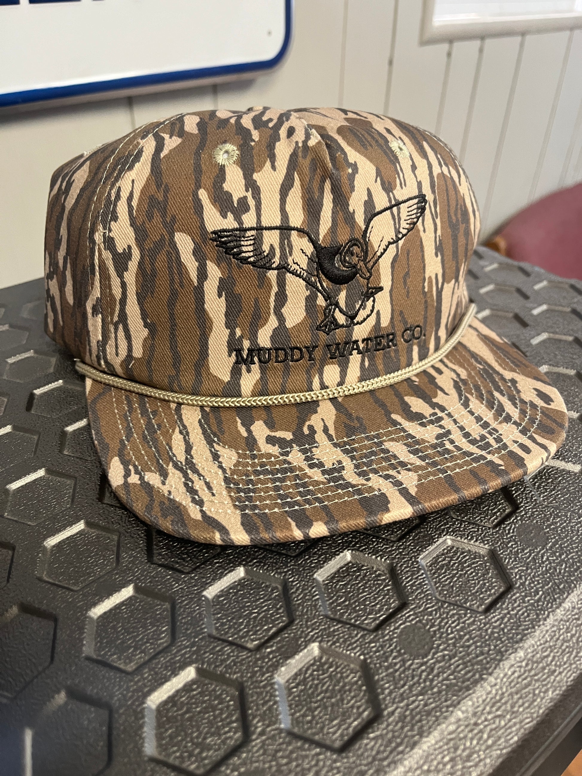 Muddy Water Hat with Solid Back, Flat Bill, Timber Camo with Rope