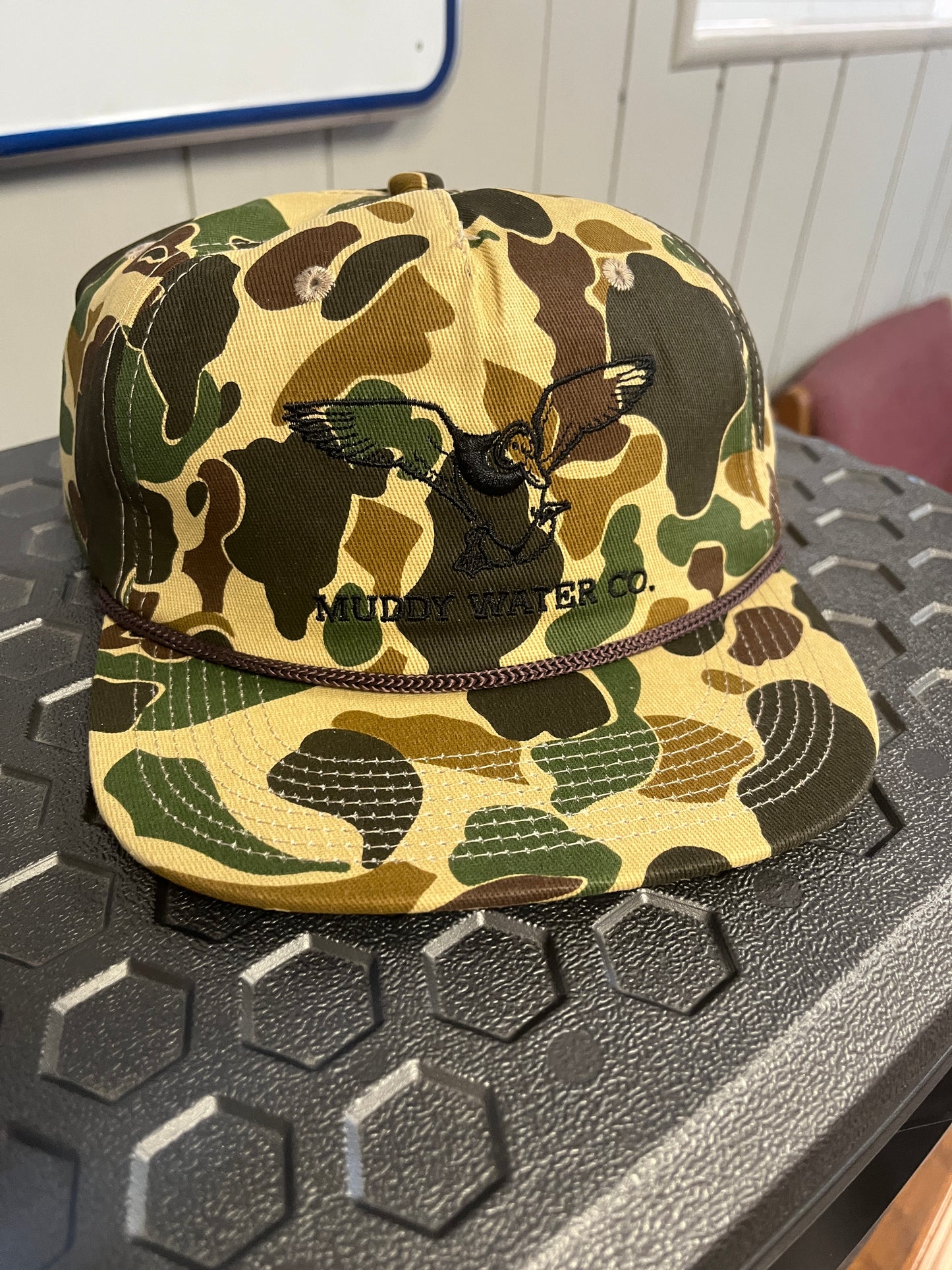 Muddy Water Hat with Solid Back, Flat Bill, Duck Camo with Rope